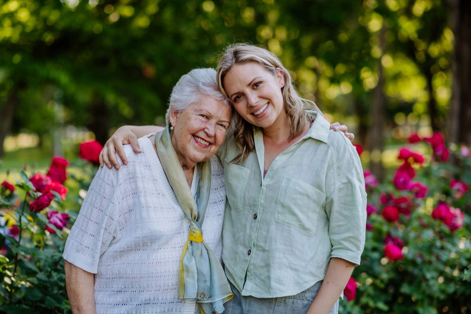 A mother and her adult daughter together.